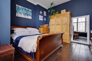 Bedroom One- click for photo gallery